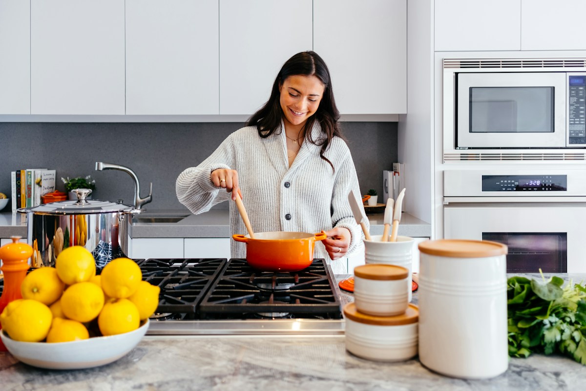 Renovated kitchen with warm cabinetry and clean surfaces